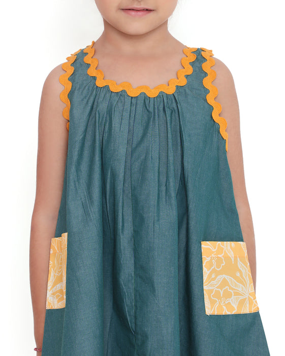 Lagoon striped Mangalgiri cotton dress with yellow lace trims and tassel tie-up, front view.