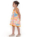 Young girl wearing a colorful Whimsy Hills limited edition sleeveless dress with Schiffli cotton embroidery and yellow lace trim