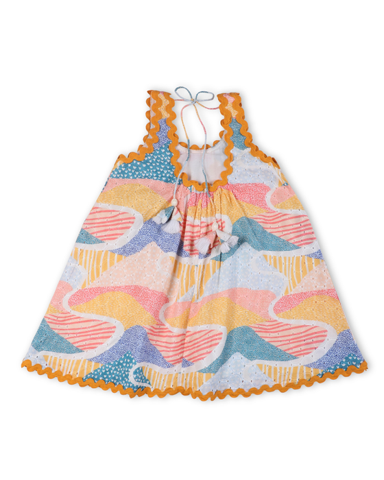 Front view of colorful Whimsy Hills limited edition dress with Schiffli cotton embroidery and yellow lace trim, worn by a young girl