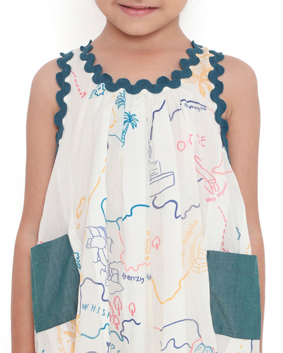 Close-Up view of a Voyager Trails cotton dress with multicolour map print, blue lace trim, and tassel tie-up detail