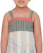 Young girl wearing a Voyager Trails midi dress with a multicolour map print, green striped bodice, and pink lace trim, posing confidently.