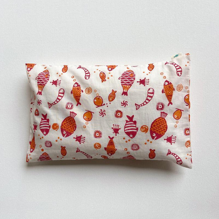 Handcrafted organic pillows and maracas for babies